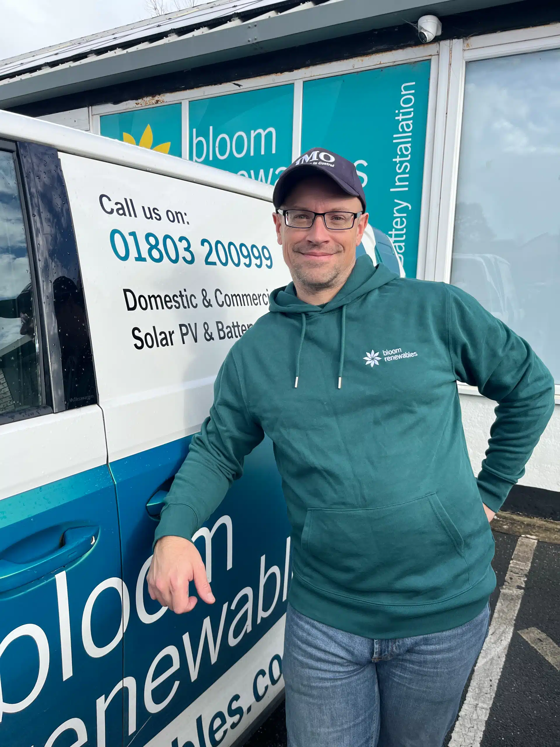 Man leaning on a van